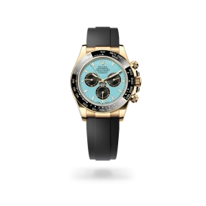 Rolex Cosmograph Daytona in yellow gold with turquoise blue and black dial, black monobloc Cerachrom bezel, and Oysterflex bracelet - Gandelman