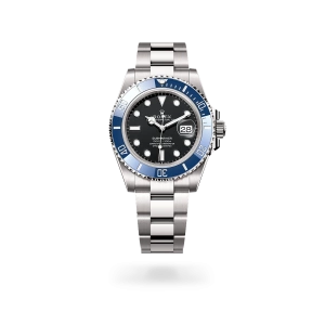 Rolex Submariner Date in white gold with a black dial, blue ceramic and platinum bezel, and Oyster bracelet - Gandelman