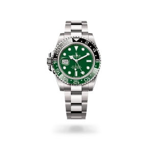 Rolex GMT-Master II in white gold with a green ceramic dial, bidirectional rotatable 24-hour graduated  bezel, and Oyster bracelet - Gandelman