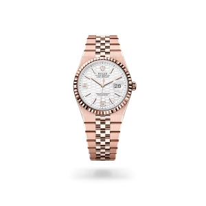 Rolex Land-Dweller 36 in Everose gold with an intense white dial, fluted bezel, and flat Jubilee bracelet - Gandelman