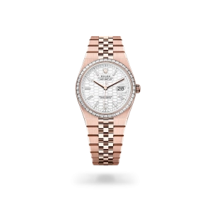 Rolex Land-Dweller 36 in Everose gold and diamonds with an intense white dial, bezel set with diamonds, and flat Jubilee bracelet- Gandelman