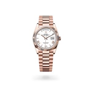 Rolex Day-Date 36 in Everose gold, White dial, fluted bezel, and President bracelet - Gandelman