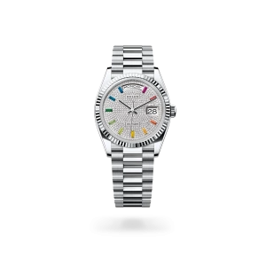 Rolex Day-Date 36 in platinum, Diamond-paved dial, fluted bezel, and President bracelet - Gandelman