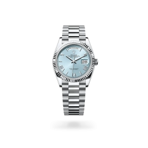 Rolex Day-Date 36 in platinum with an ice blue dial, fluted bezel, and President bracelet - Gandelman