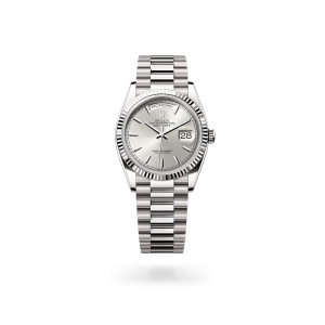 Rolex Day-Date 36 in white gold with a silver dial, fluted bezel, and President bracelet - Gandelman