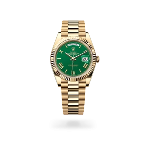 Rolex Day-Date 40 in yellow gold with a Green dial, fluted bezel, and President bracelet - Gandelman