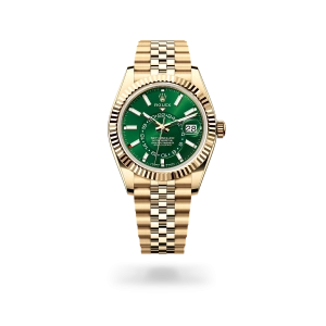 Rolex Sky-Dweller in yellow gold with a bright green dial, fluted bezel, and Jubilee bracelet - Gandelman