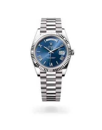 Rolex Day-Date 40 in white gold with a Bright blue dial, fluted bezel, and President bracelet - Gandelman