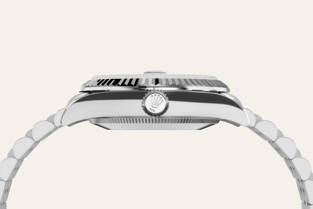 Rolex Datejust 31 in Oystersteel and white gold with a Pink dial, fluted bezel, Jubilee bracelet, m278274-0014 - Gandelman
