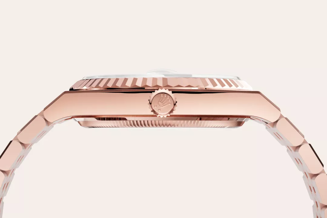 Rolex Land-Dweller 36 in Everose gold with an intense white dial, fluted bezel, and flat Jubilee bracelet, m127235-0001 - Gandelman