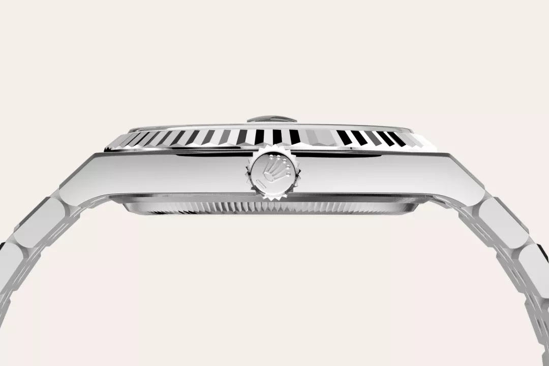 Rolex Land-Dweller 40 in Oystersteel and white gold with an Intense white dial, fluted bezel, and flat Jubilee bracelet, m127334-0001 - Gandelman