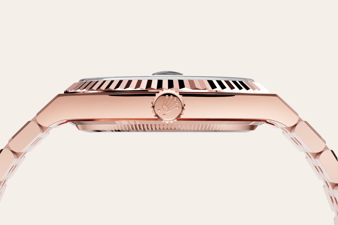 Rolex Land-Dweller 40 in Everose gold with an Intense white dial, fluted bezel, and flat Jubilee bracelet, m127335-0001 - Gandelman